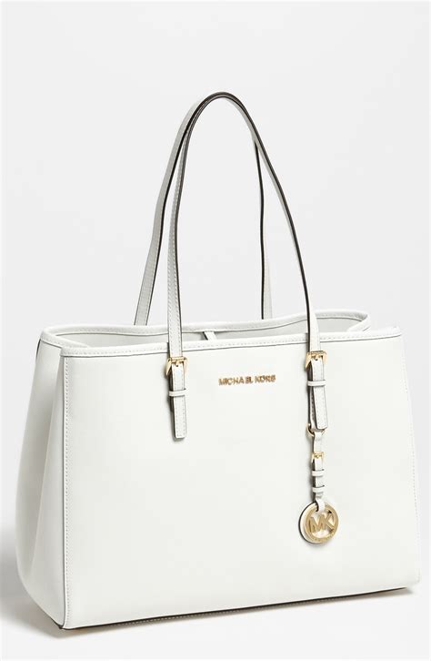 michael kors white tassel bag|Michael Kors optic white handbags.